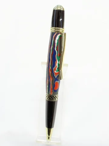 Sierra Mesa Gatsby pen turned in Fordite with gold trim, handcrafted by Paul