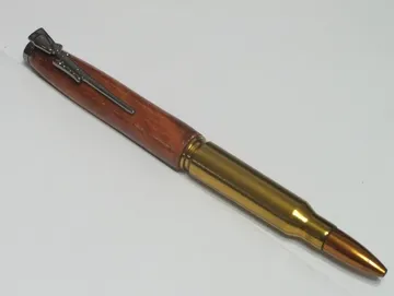 .308 rifle cartridge pen in afzelia with a gun metal clip and cap